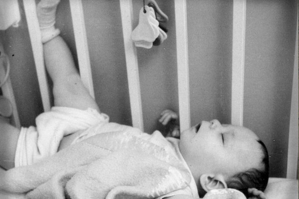 003 - Sleeping in crib - 1963.jpg