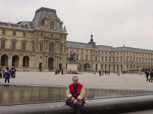 029 - Sitting in Louvre Courtyard - 2004.jpg